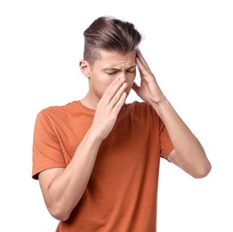 Young man suffering from sinusitis on white background