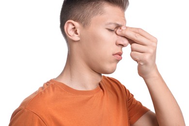 Photo of Young man suffering from sinusitis on white background