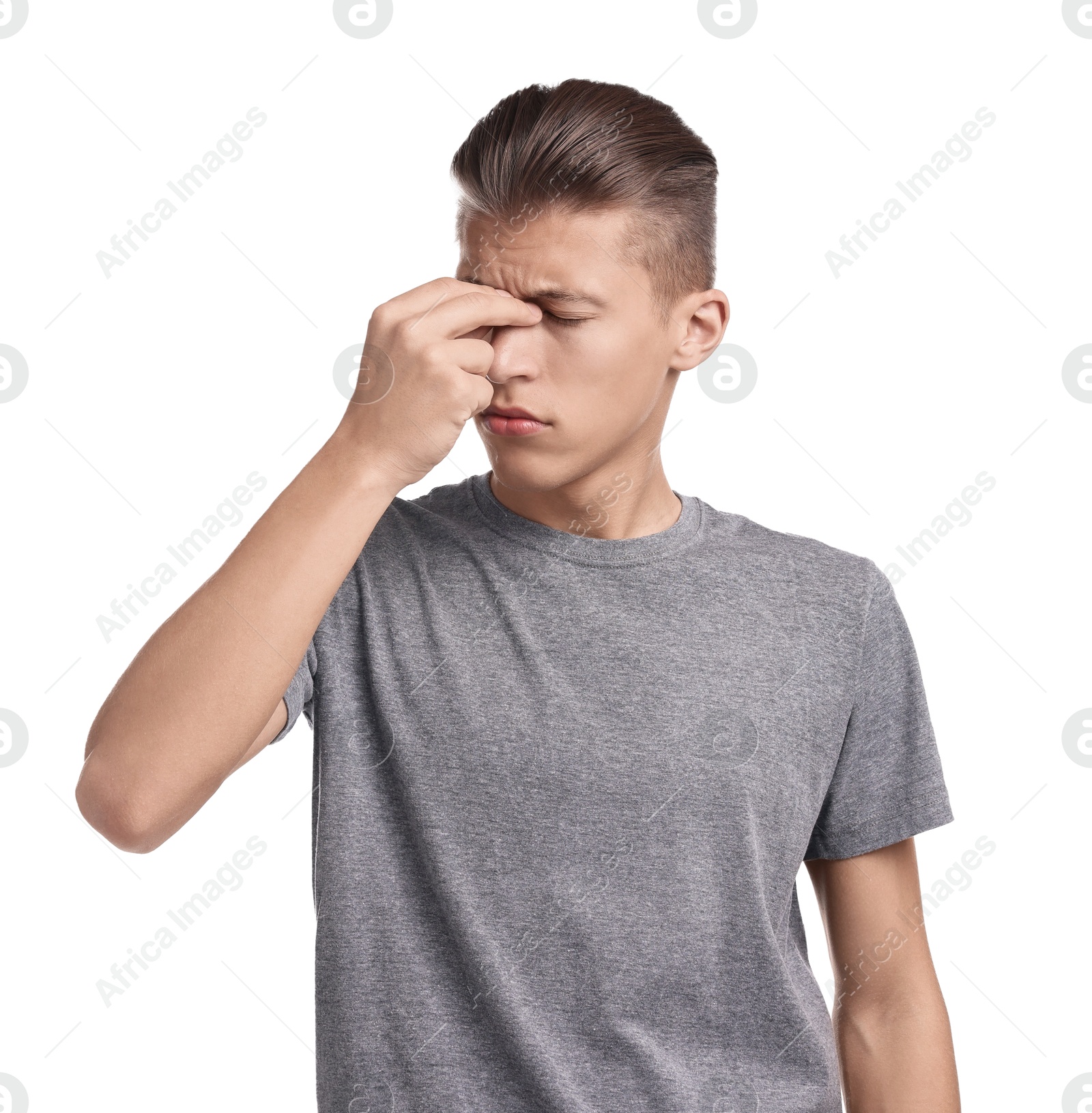 Photo of Young man suffering from sinusitis on white background