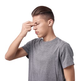 Young man suffering from sinusitis on white background