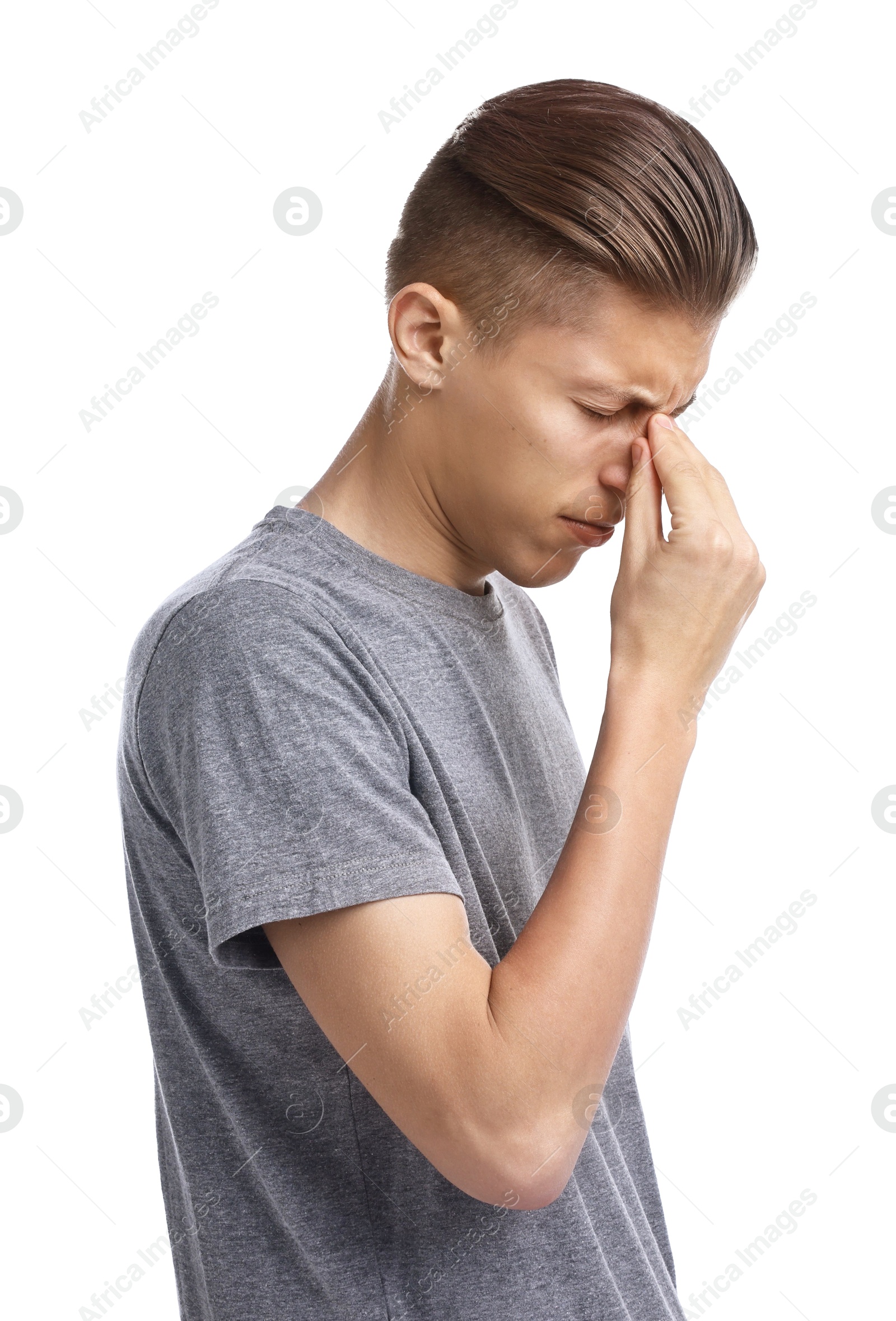 Photo of Young man suffering from sinusitis on white background