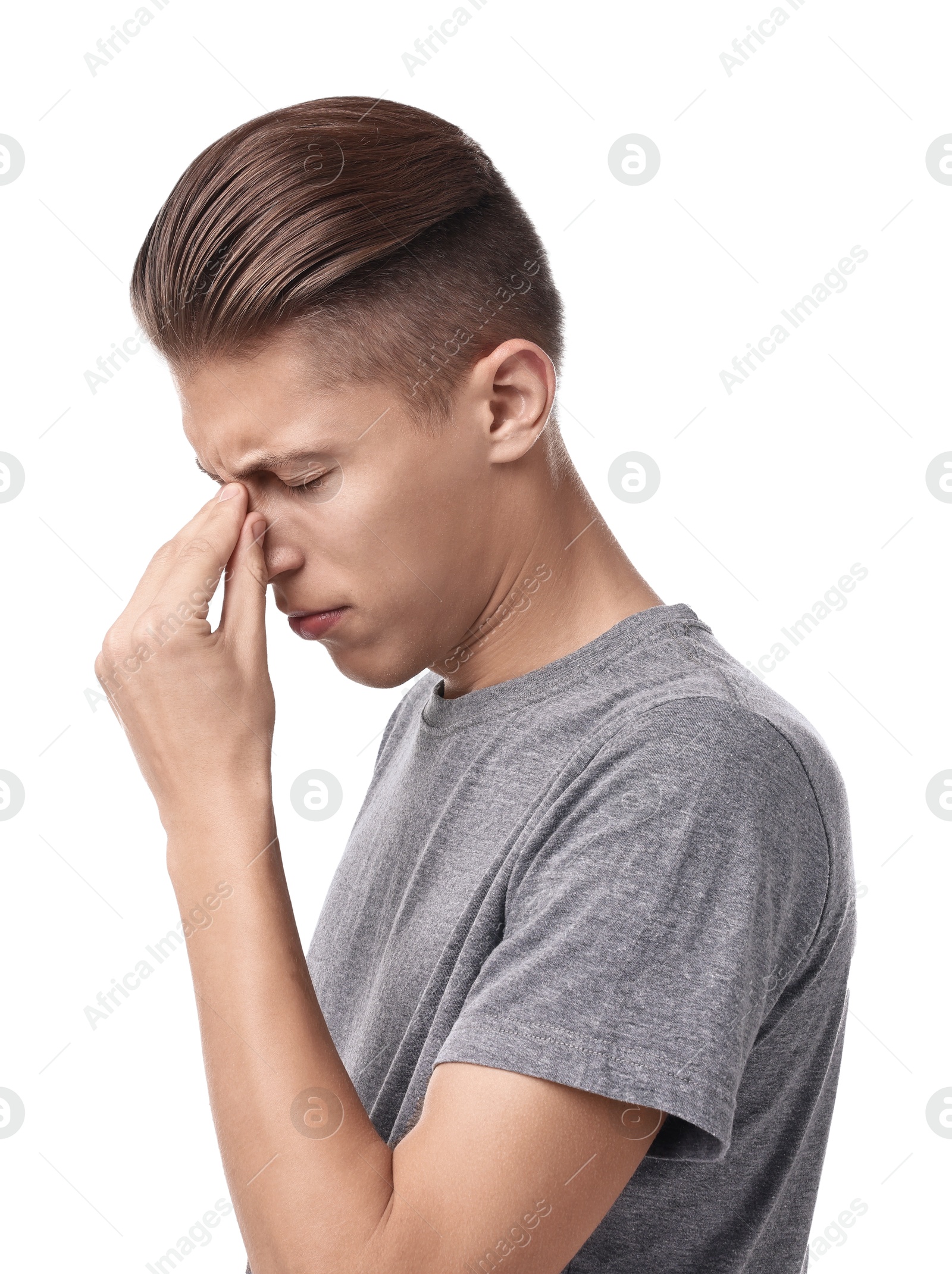 Photo of Young man suffering from sinusitis on white background