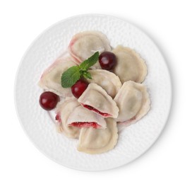 Photo of Traditional Ukrainian dumplings (varenyky) with cherries isolated on white, top view