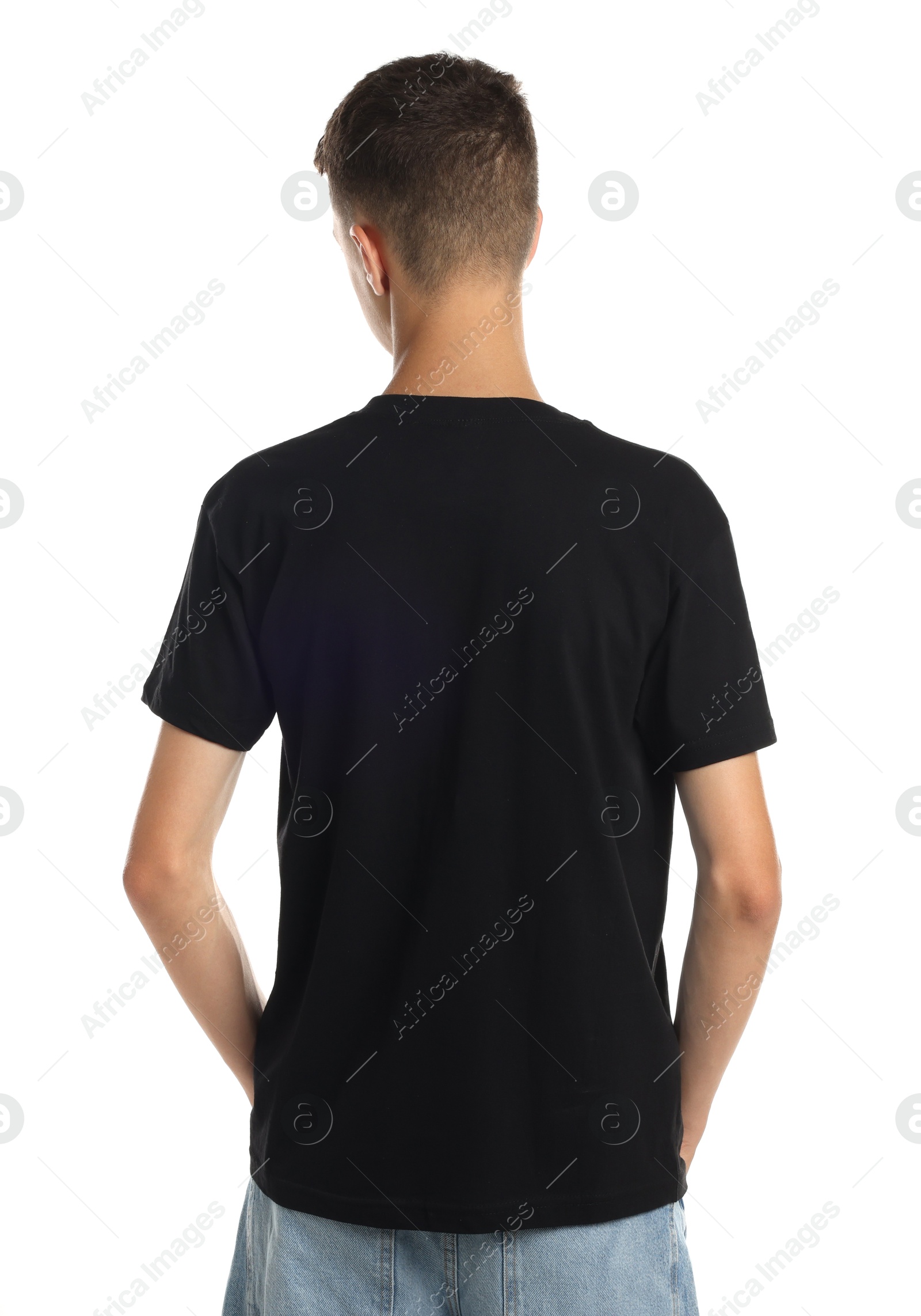 Photo of Teenage boy wearing black t-shirt on white background, back view