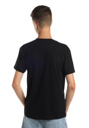 Teenage boy wearing black t-shirt on white background, back view