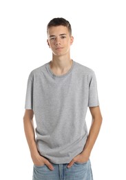 Teenage boy wearing grey t-shirt on white background