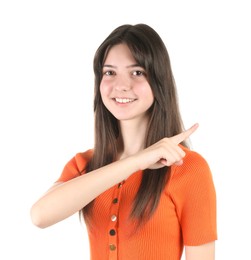 Portrait of smiling teenage girl on white background