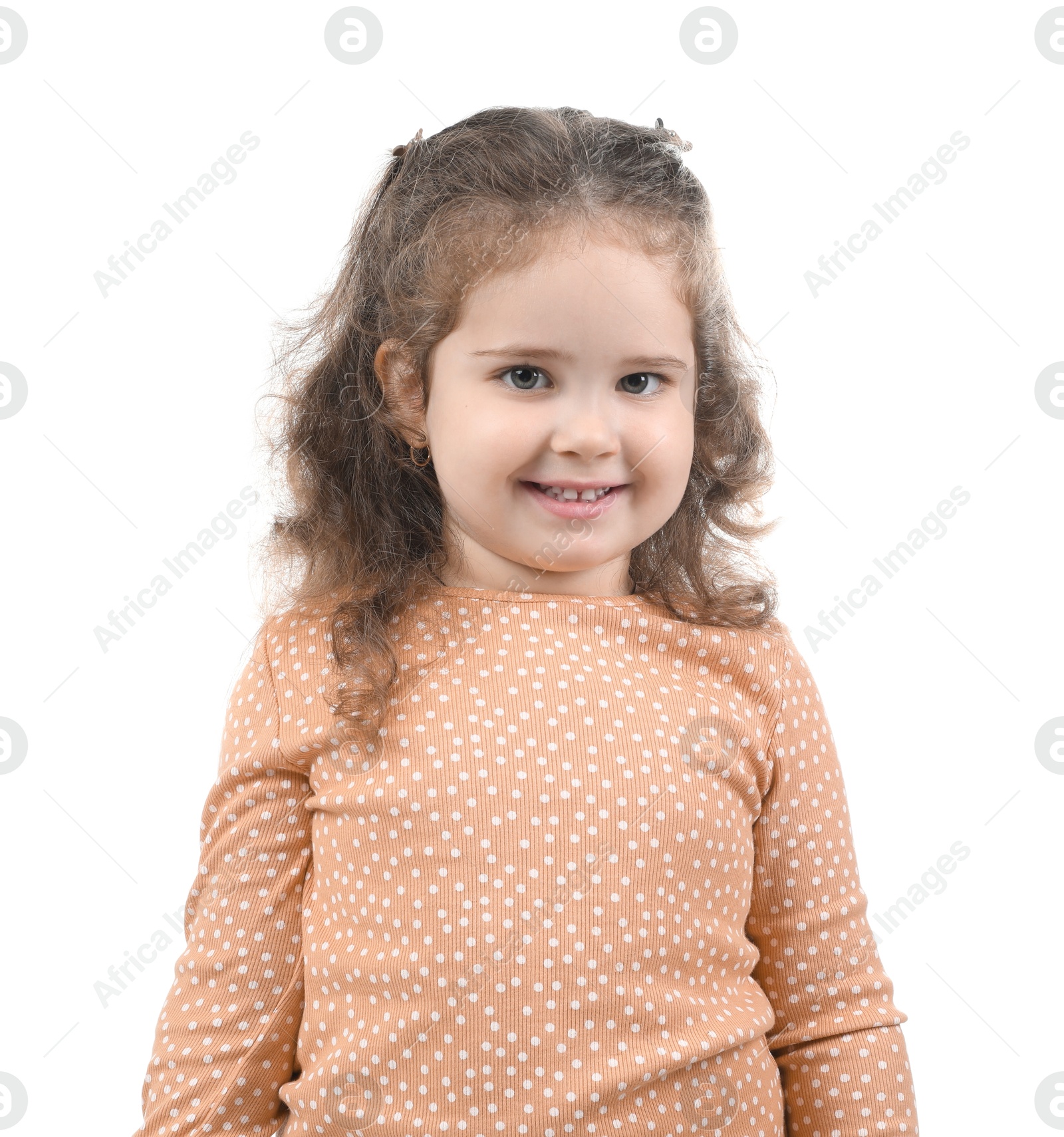 Photo of Portrait of smiling girl on white background. Adorable child