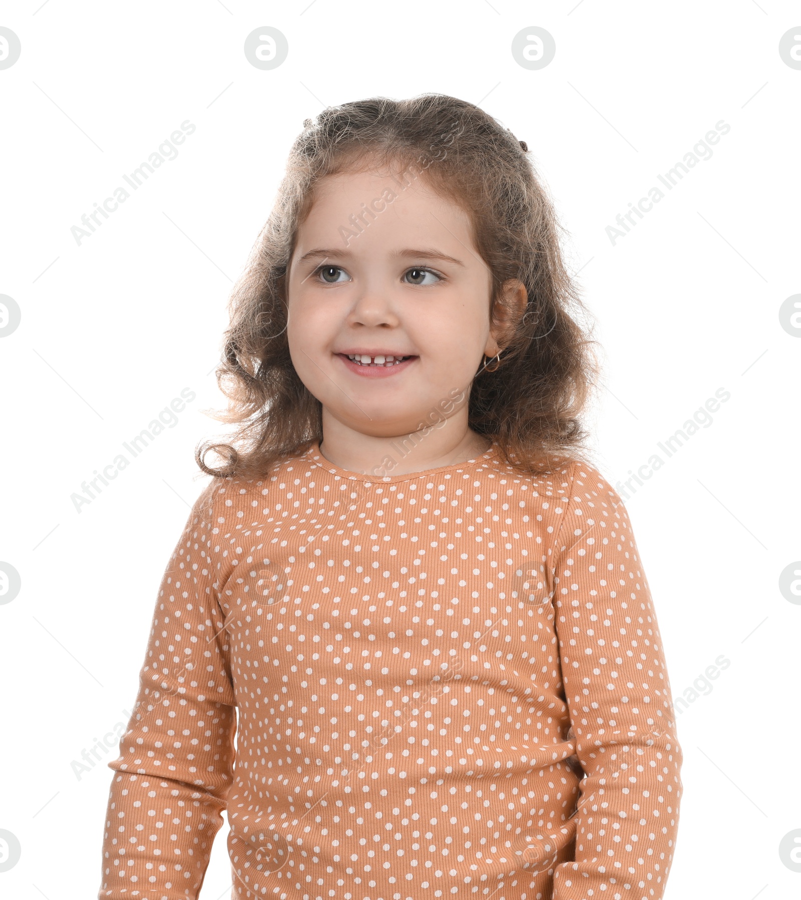 Photo of Portrait of smiling girl on white background. Adorable child