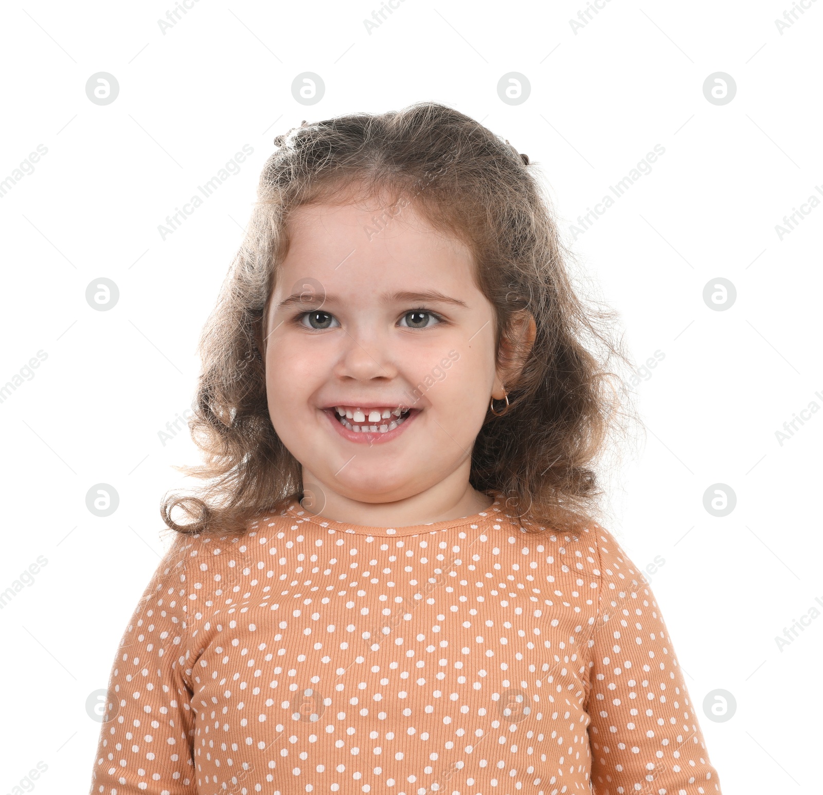 Photo of Portrait of smiling girl on white background. Adorable child