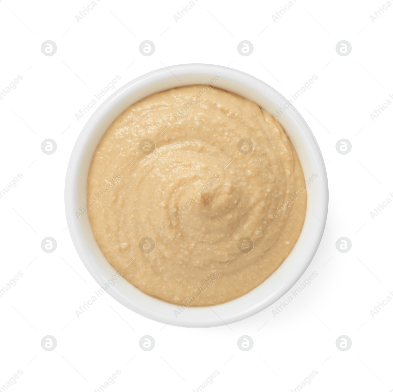 Photo of Delicious hummus in bowl isolated on white, top view