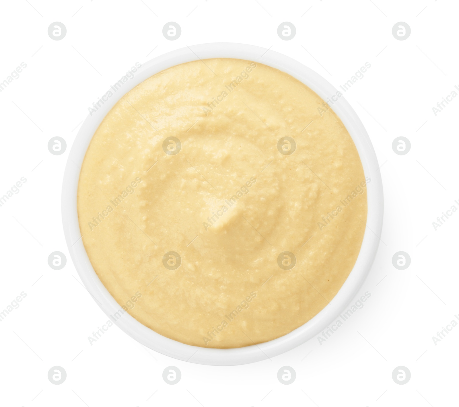 Photo of Delicious hummus in bowl isolated on white, top view