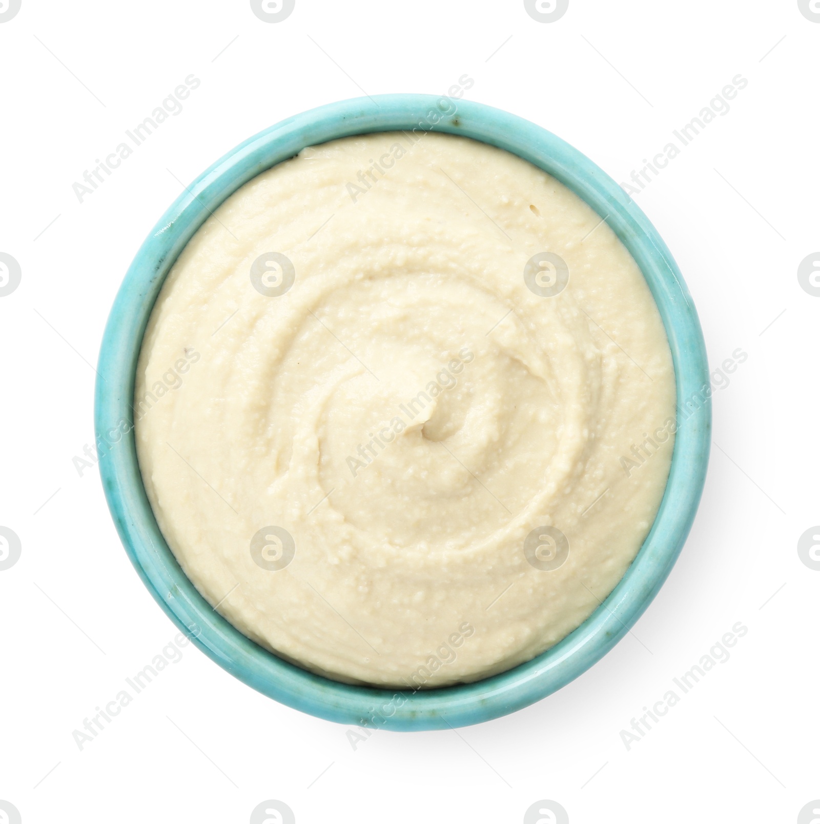 Photo of Delicious hummus in bowl isolated on white, top view