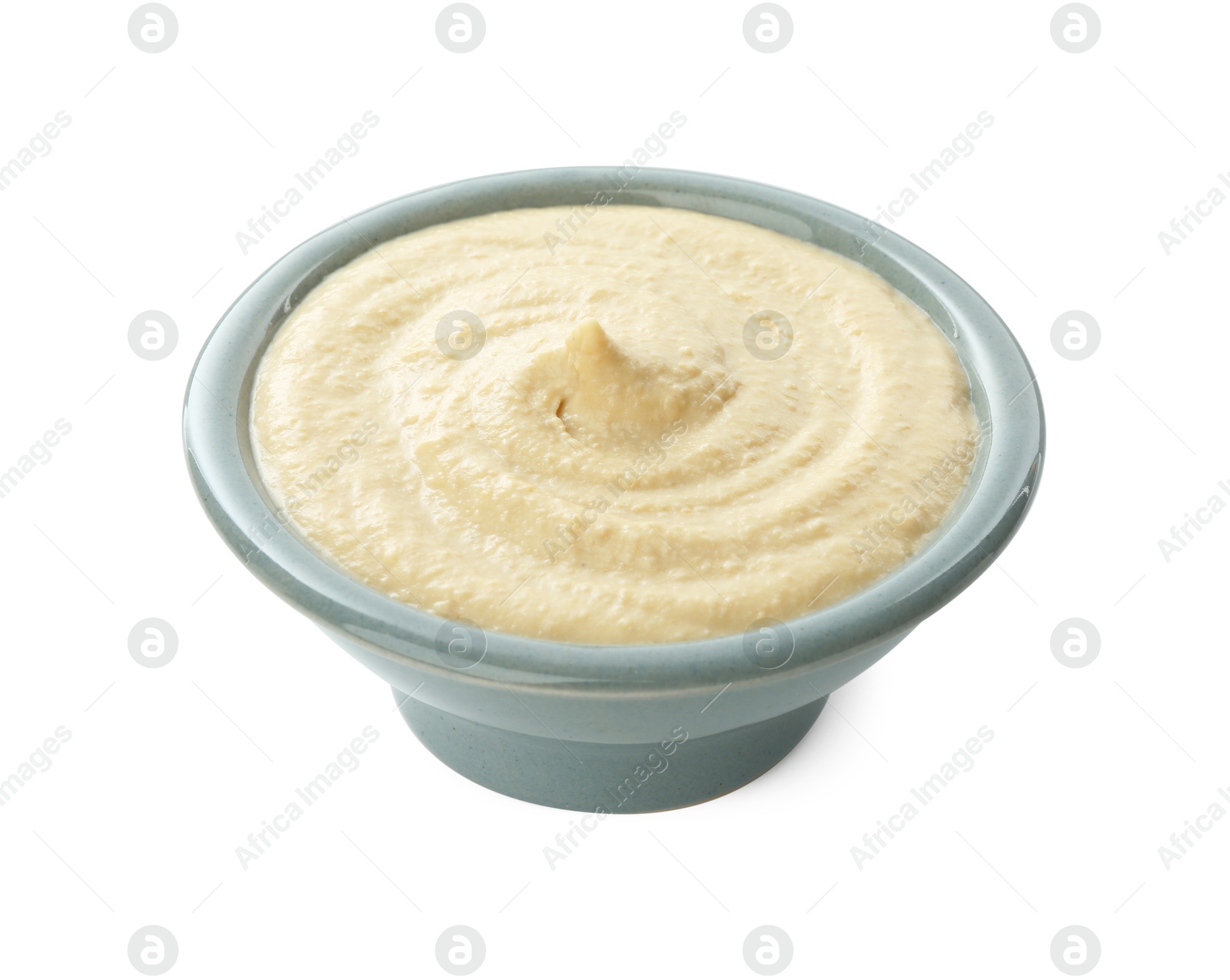 Photo of Delicious hummus in bowl isolated on white