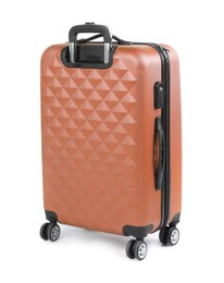 Image of One closed orange suitcase isolated on white