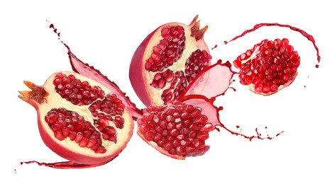 Image of Juice splashes and fresh pomegranates in air on white background