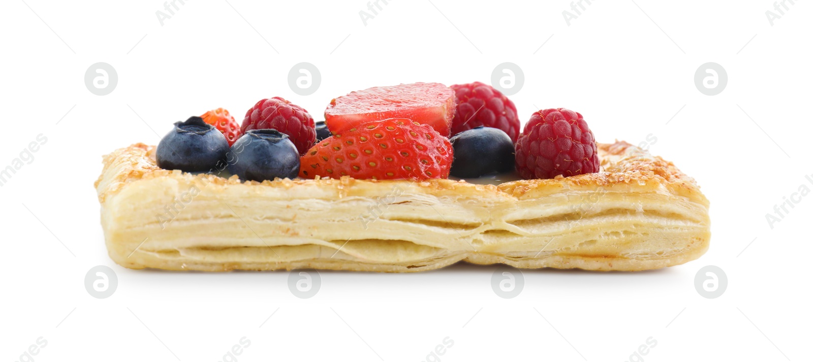 Photo of Tasty puff pastry with berries isolated on white