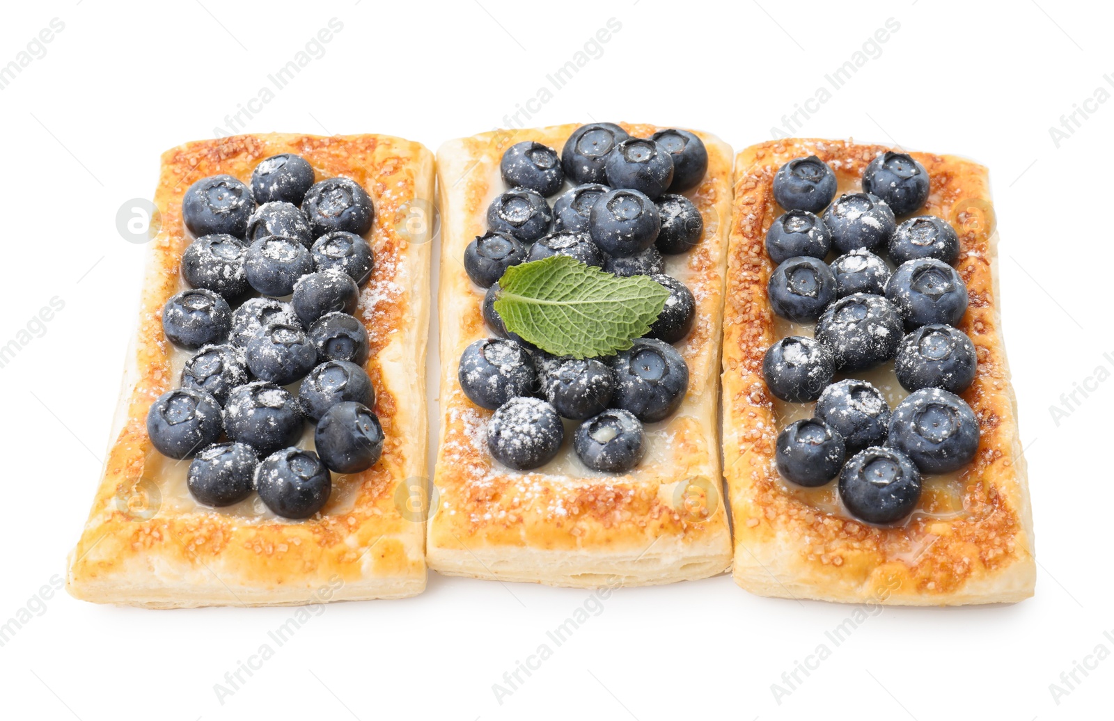 Photo of Tasty puff pastries with blueberries isolated on white