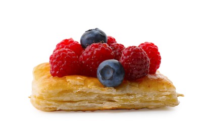 Photo of Tasty puff pastry with berries isolated on white