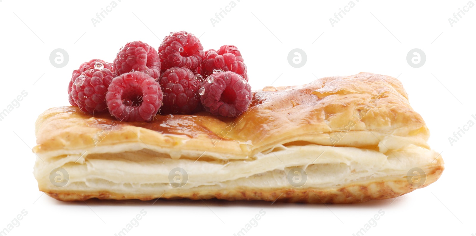 Photo of Tasty puff pastry with raspberries isolated on white