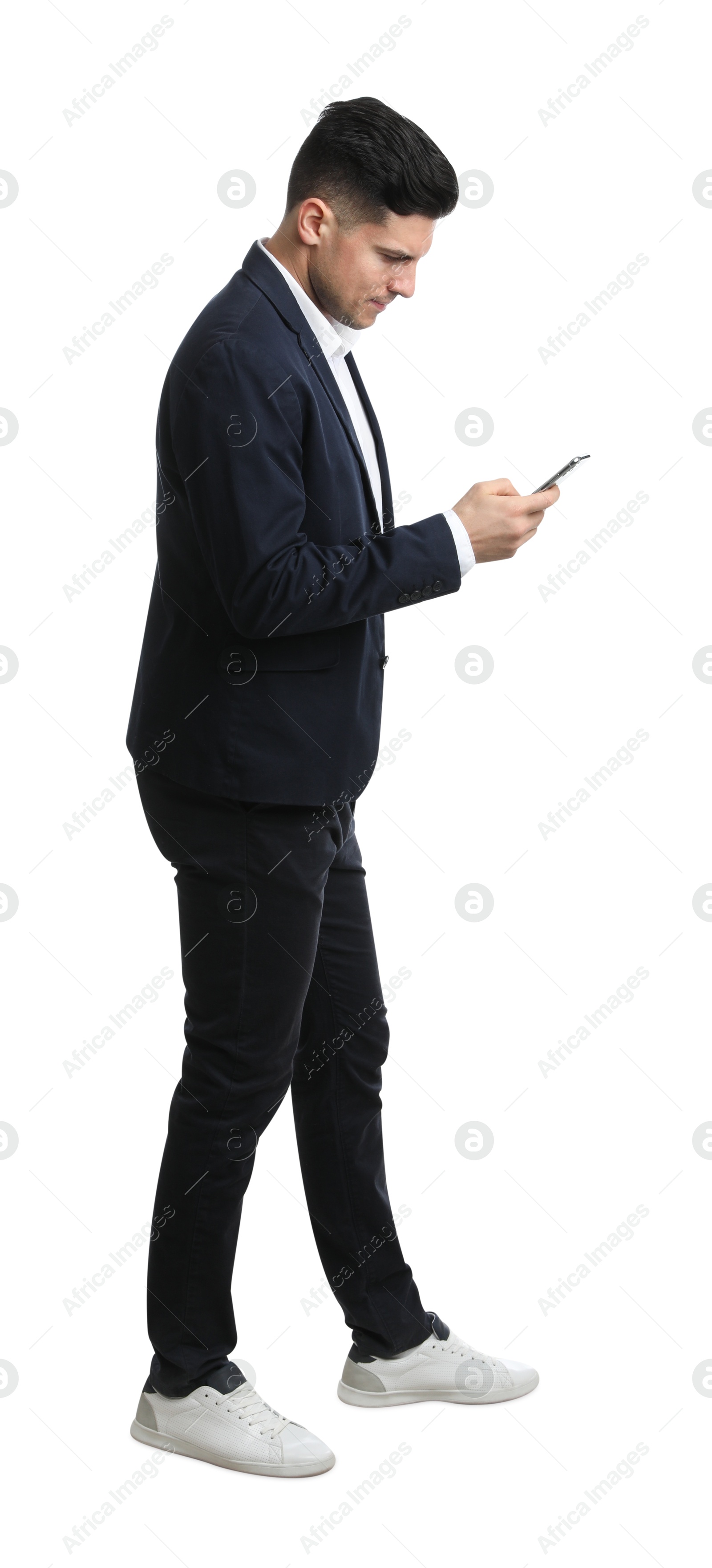 Photo of Businessman in suit with smartphone on white background