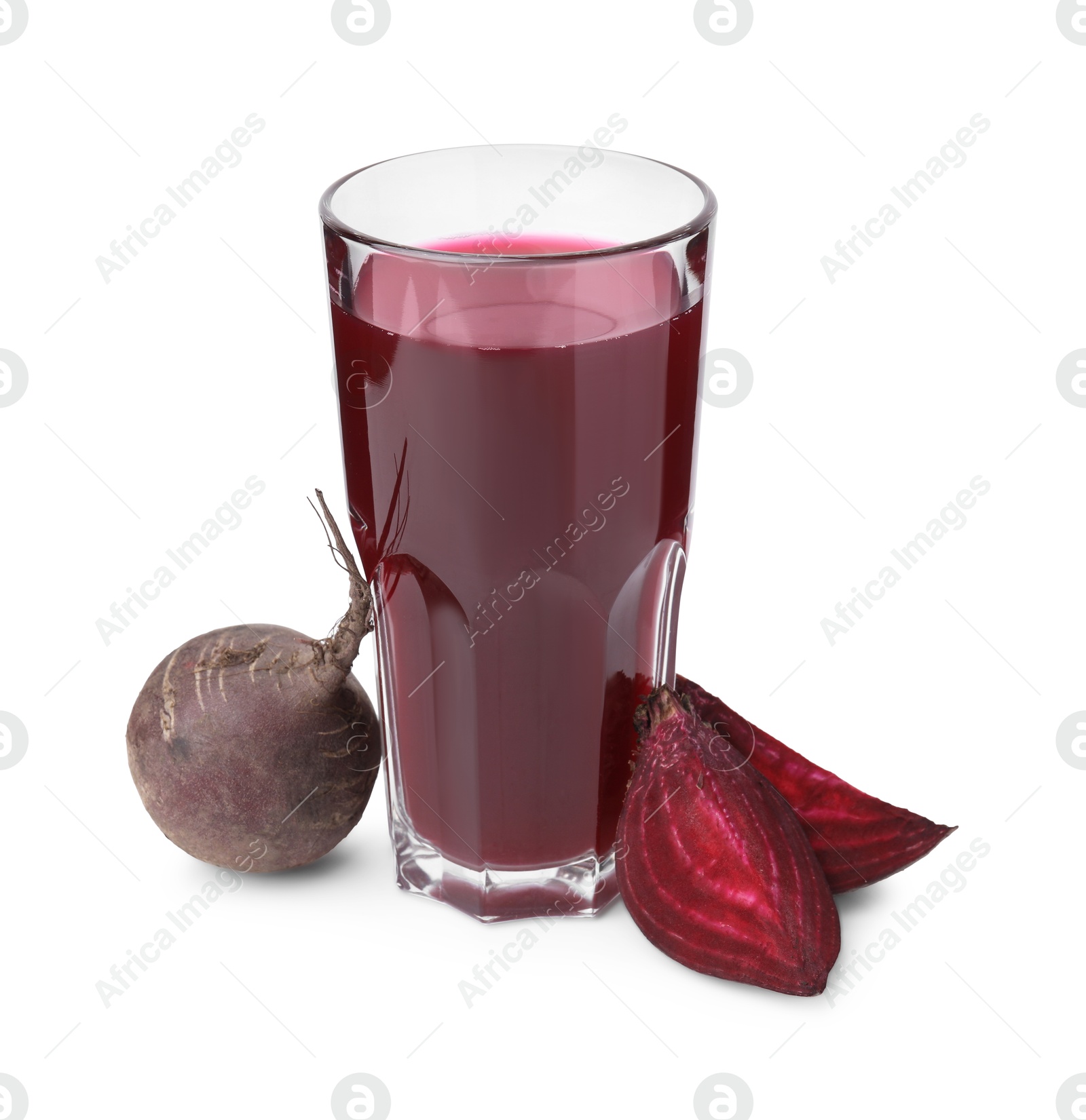 Photo of Fresh beet juice in glass and ripe vegetables isolated on white