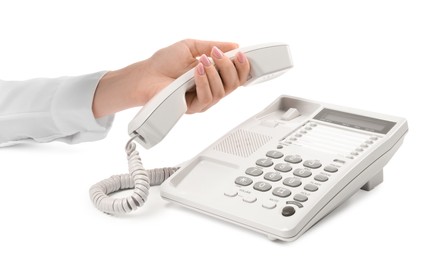 Photo of Woman taking handset of telephone on white background, closeup