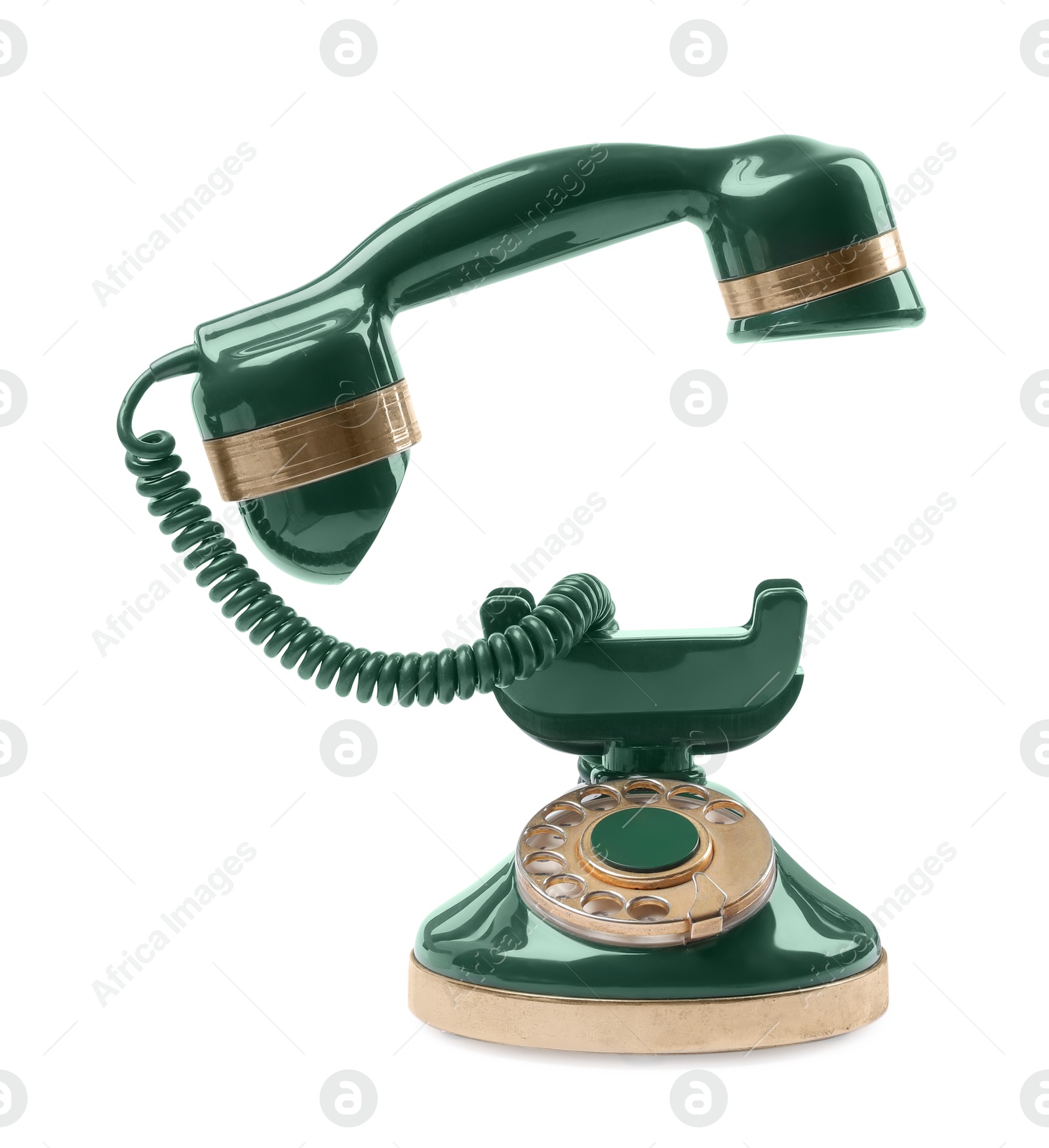 Photo of Green vintage corded telephone isolated on white