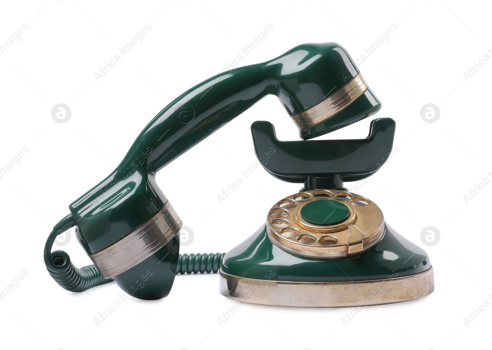 Photo of Green vintage corded telephone isolated on white