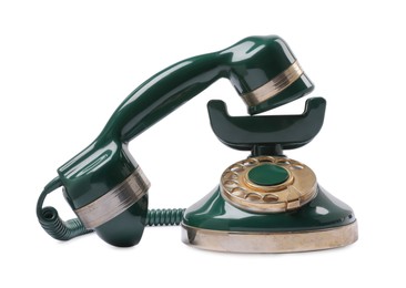 Green vintage corded telephone isolated on white