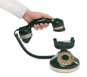 Photo of Woman with green vintage corded telephone on white background, closeup