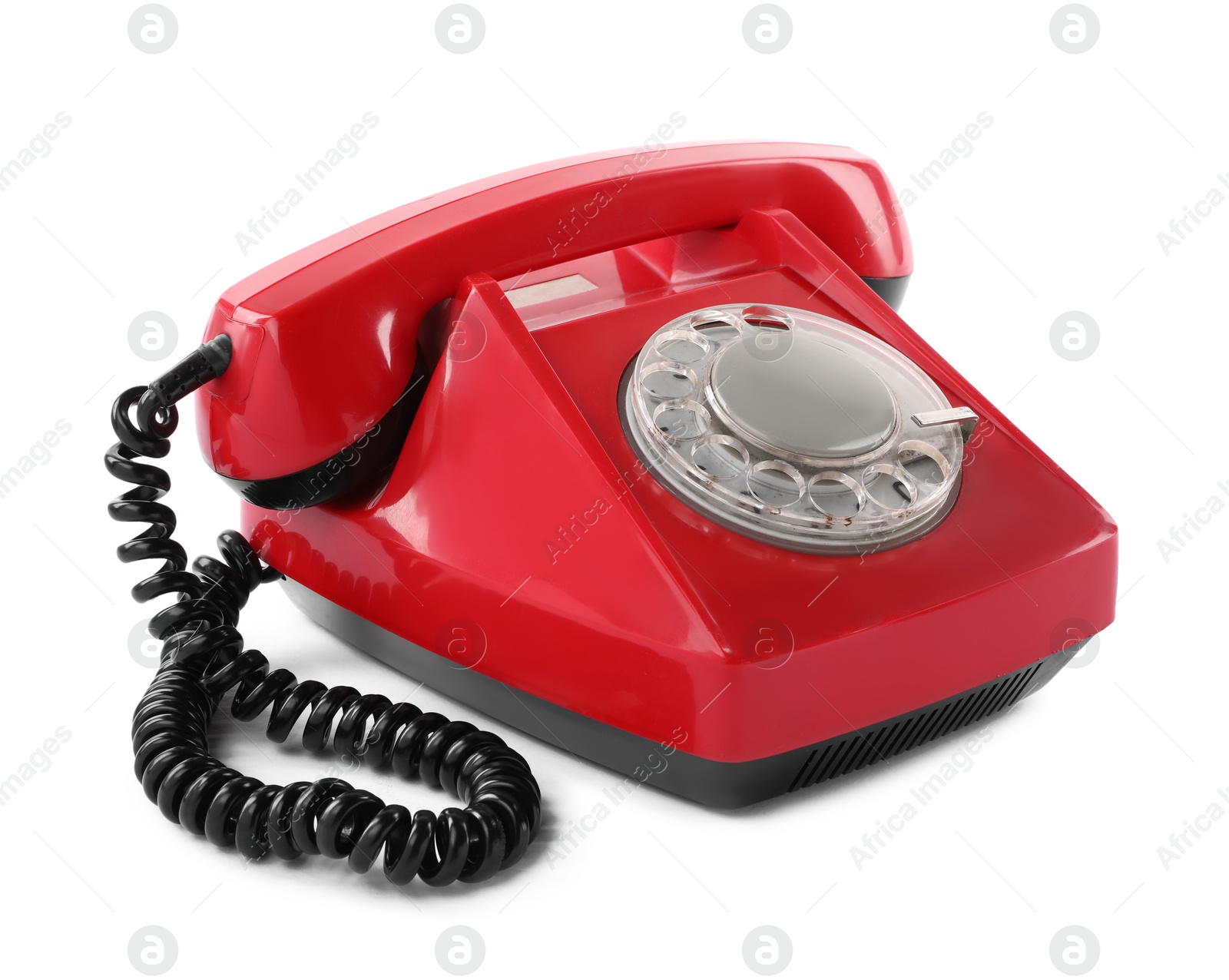 Photo of One red telephone with handset isolated on white