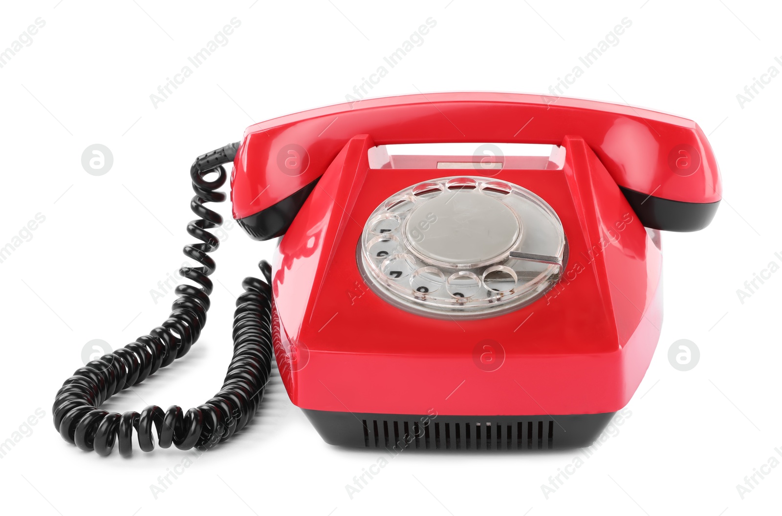 Photo of One red telephone with handset isolated on white