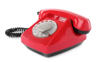 Photo of One red telephone with handset isolated on white