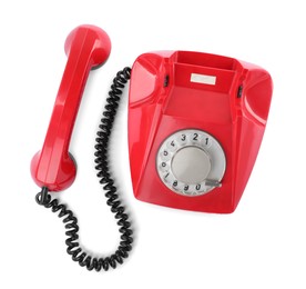 Photo of One red telephone with handset isolated on white, top view