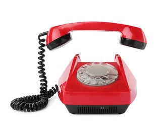 Photo of One red telephone with handset isolated on white