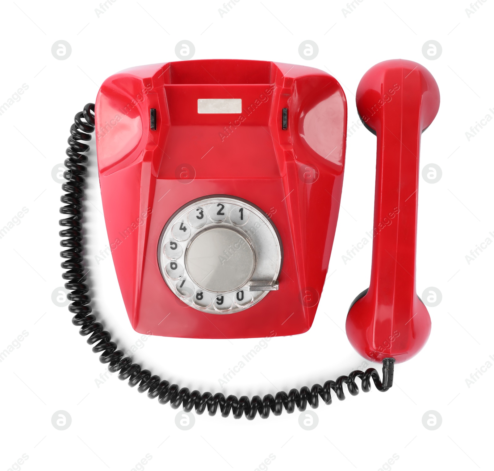 Photo of One red telephone with handset isolated on white, top view