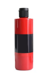 Photo of Red acrylic paint in bottle isolated on white