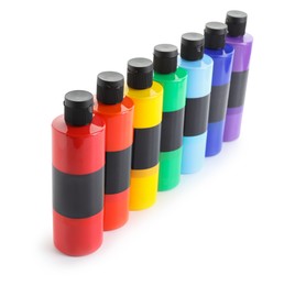 Photo of Acrylic paints of different colors in bottles isolated on white