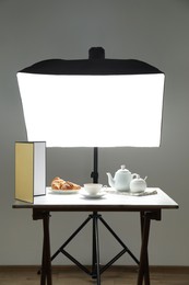 Shooting food in photo studio with professional lighting equipment