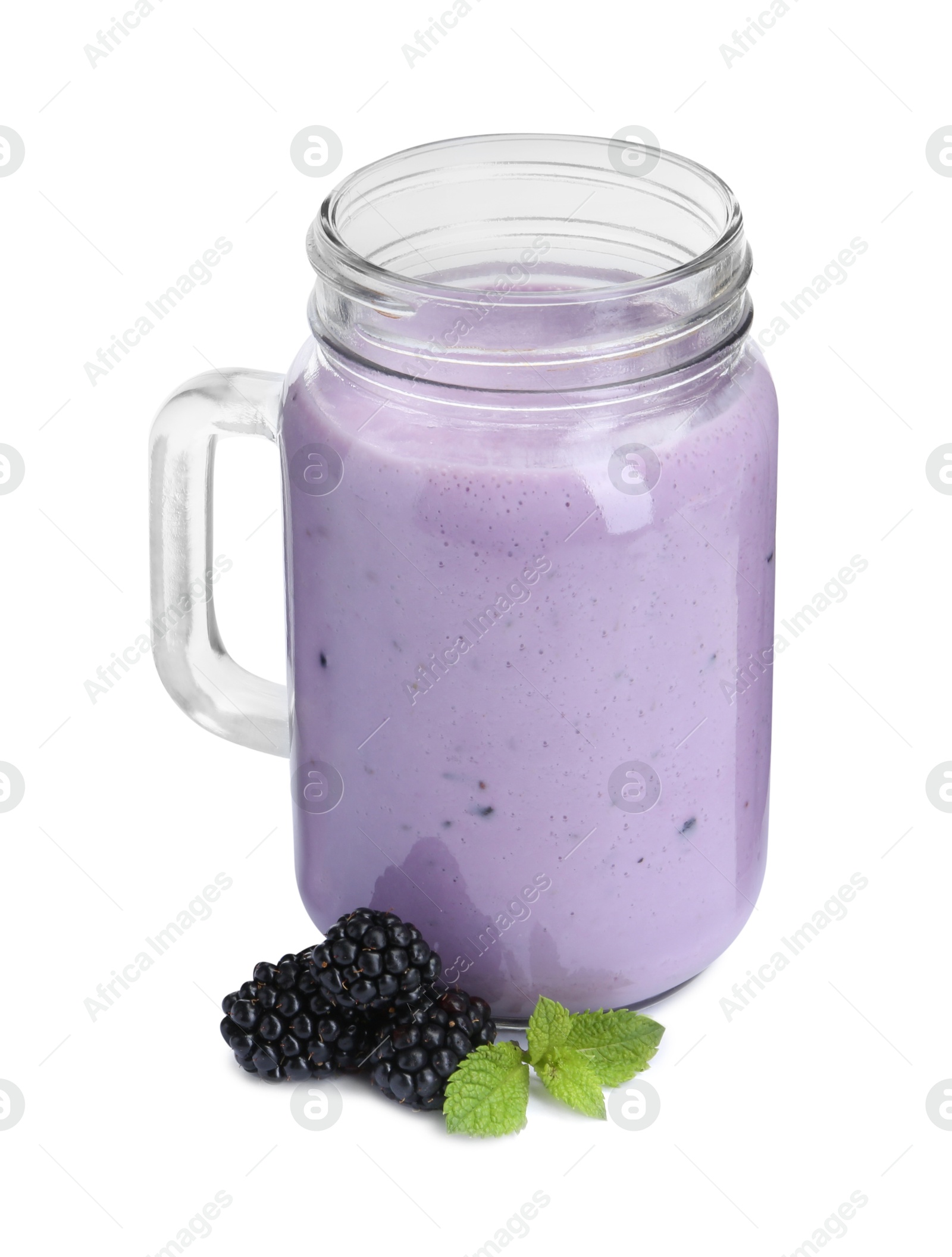 Photo of Tasty yogurt in glass, fresh blackberries and mint isolated on white