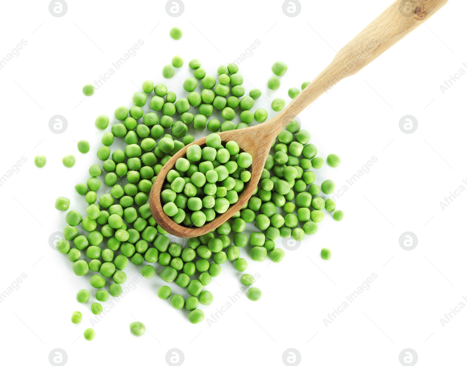 Photo of Fresh green peas in spoon isolated on white, top view