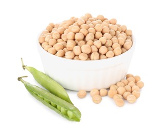 Dried peas in bowl and fresh green pods isolated on white