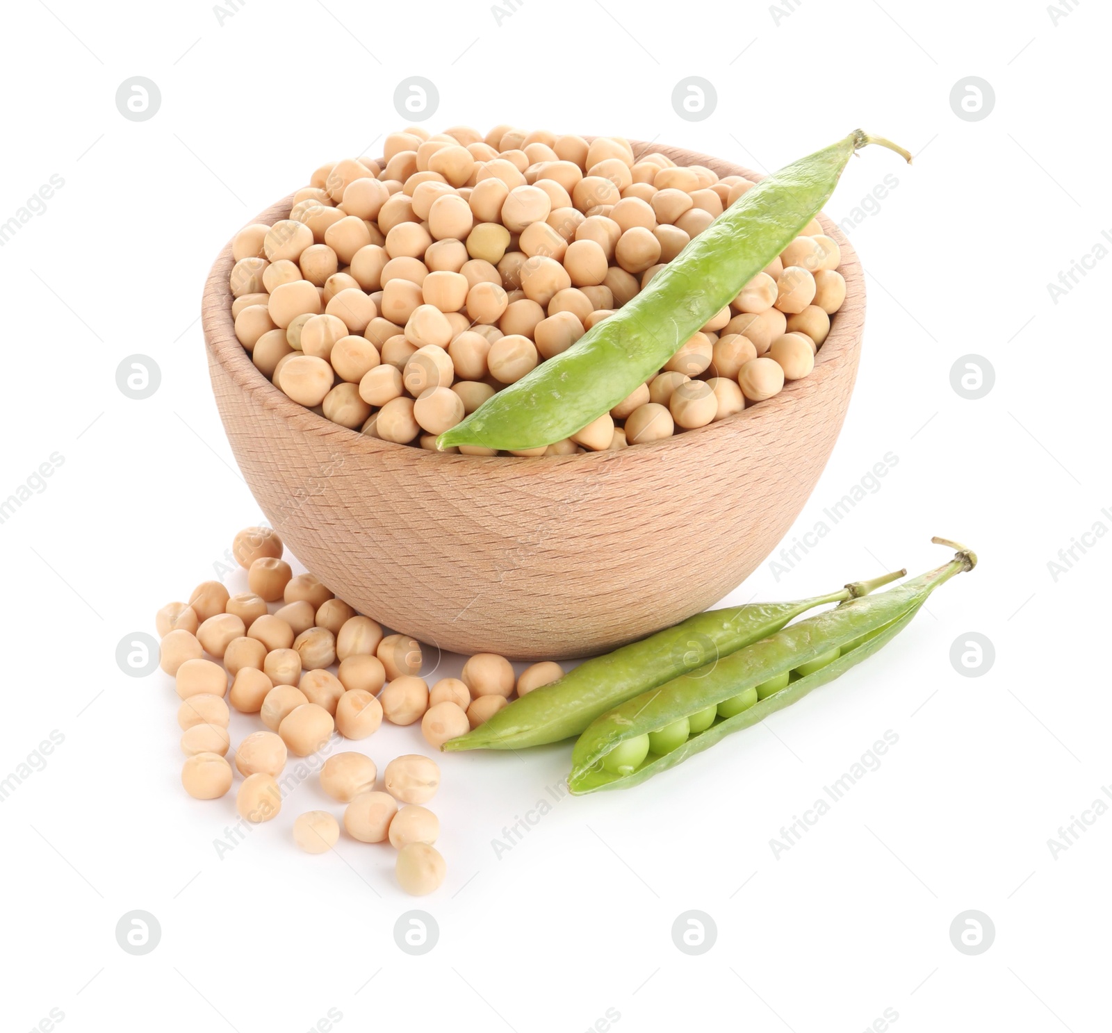 Photo of Dried peas in bowl and fresh green pods isolated on white