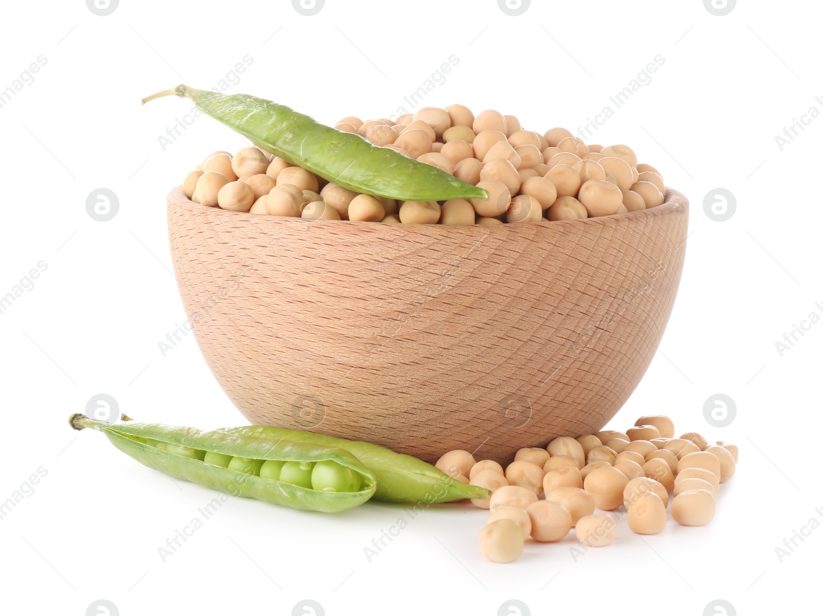 Photo of Dried peas in bowl and fresh green pods isolated on white