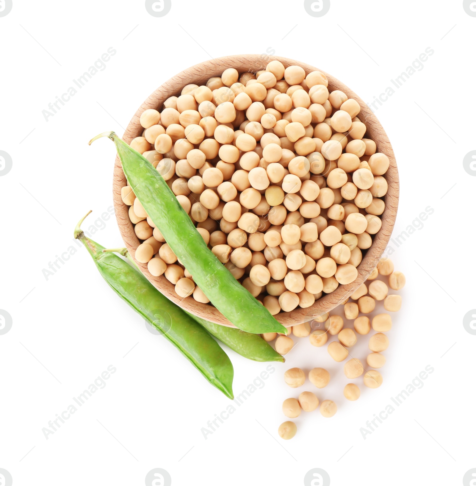 Photo of Dried peas in bowl and fresh green pods isolated on white, top view