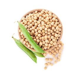 Photo of Dried peas in bowl and fresh green pods isolated on white, top view