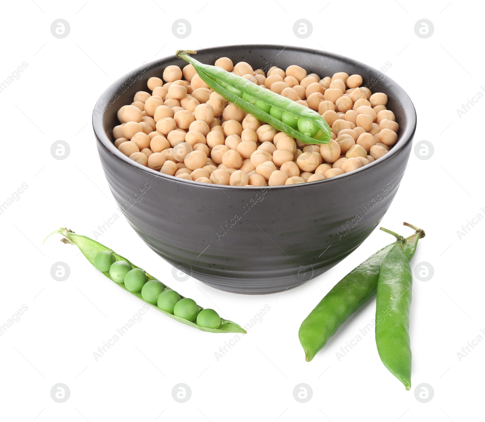 Photo of Dried peas in bowl and fresh green pods isolated on white