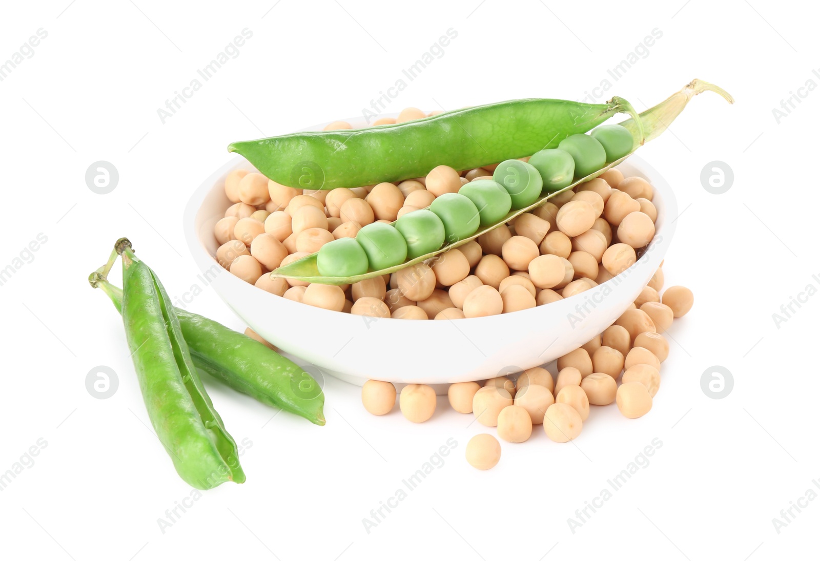 Photo of Dried peas in bowl and fresh green pods isolated on white