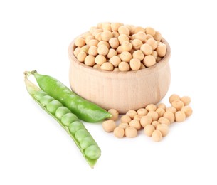 Dried peas in bowl and fresh green pods isolated on white